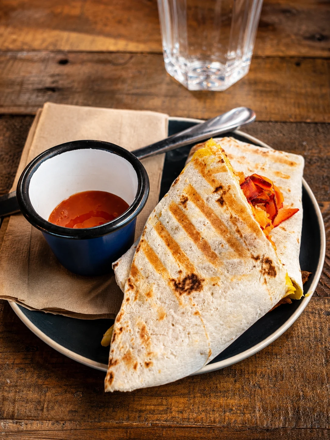 Toasted wrap with dipping sauce at Outset Coffee
